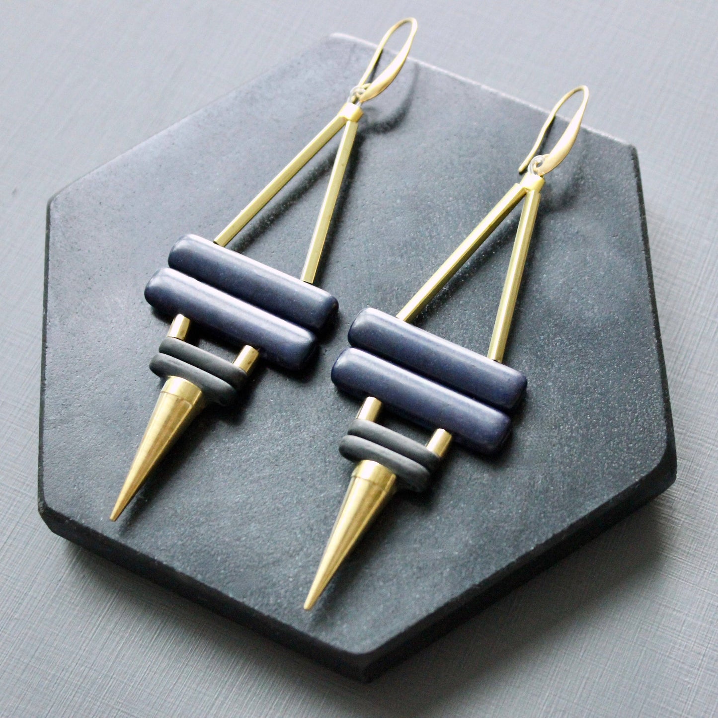 navy and black spike earrings