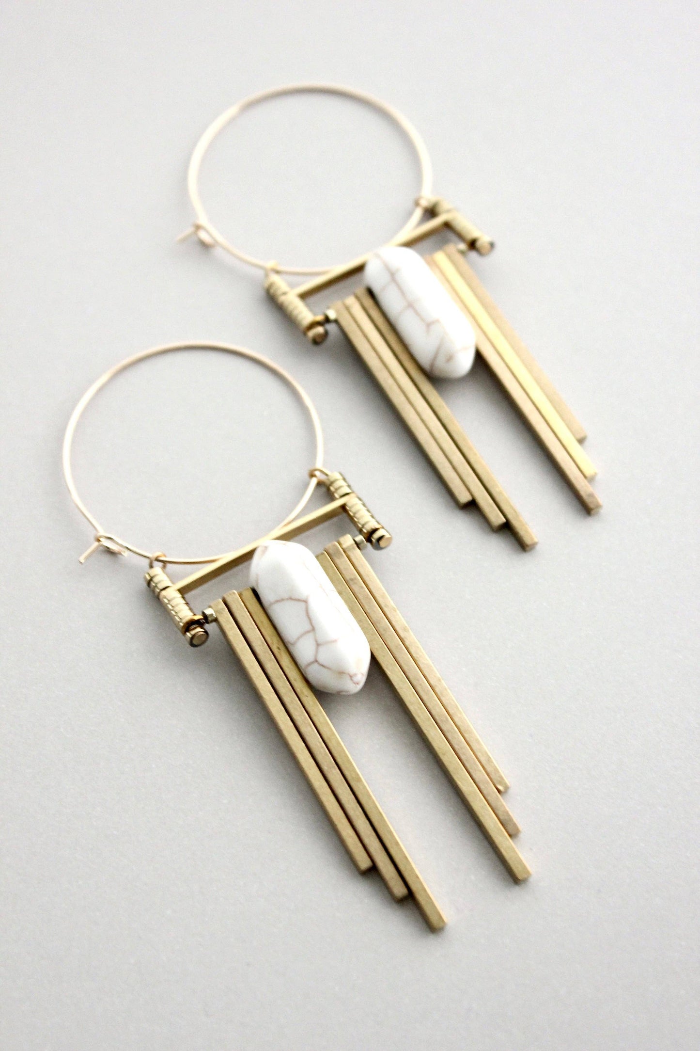 white and brass art deco hoop earrings