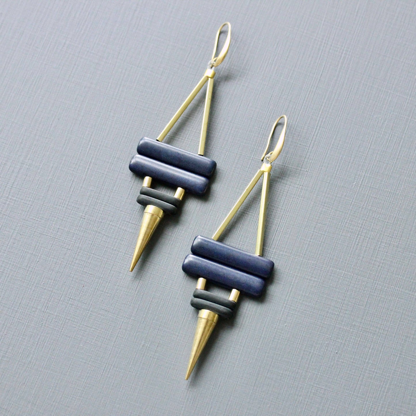 navy and black spike earrings