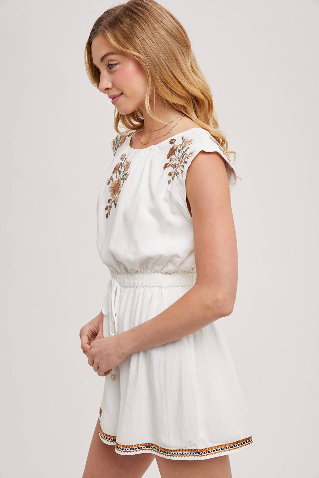 EMBROIDERED FLORAL WHITE DRAWSTRING ROMPER