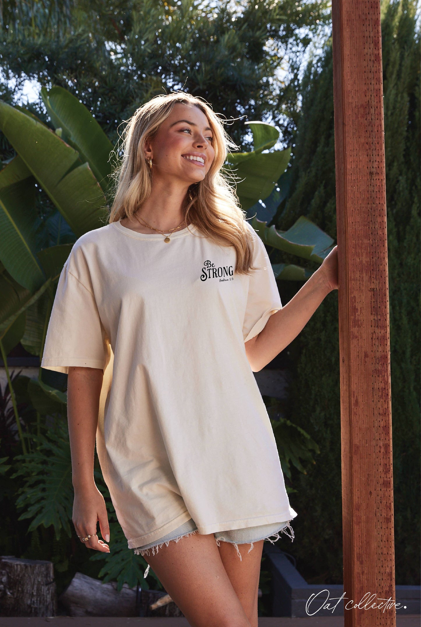 BE STRONG Oversized Graphic Top