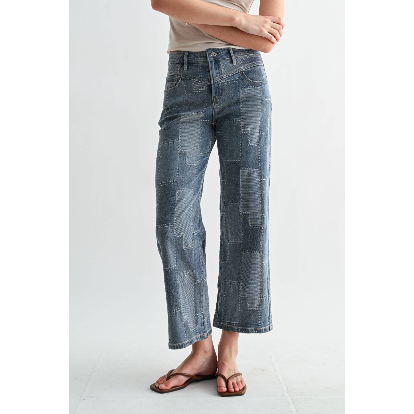 HIGH-RISE WIDE LEG ANKLE PATCH DENIM